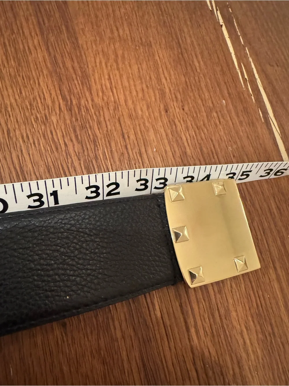 BCBG Black Faux Leather Belt with Gold Pyramid Stud Buckle. 34” long.